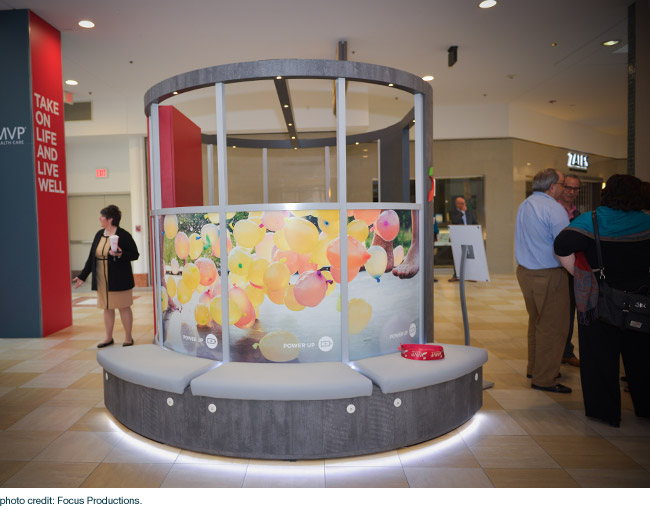 Charging stations and seating at the MVP healthcare mall kiosk