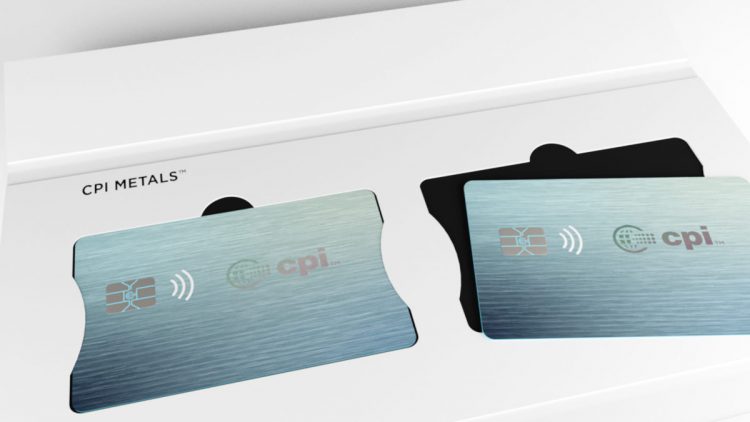 Close up of credit card packaging open with two credit cards lying on top.