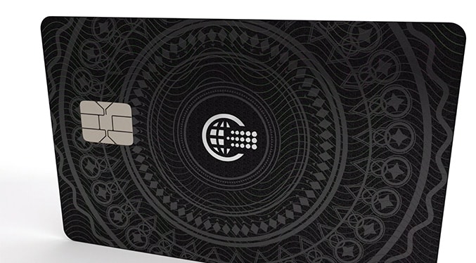 Close up of credit card with decorative pattern.