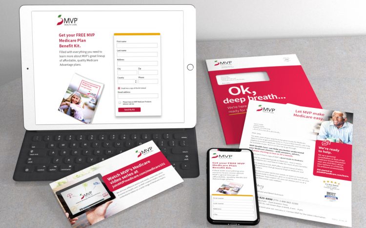 Tablet and cell phone displaying MVP's landing page along with a slef mailer package including a letter and buckslip