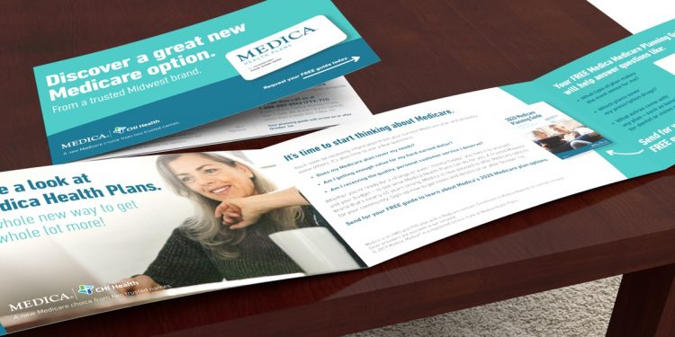 Medica brochure on wooden table top, one version shown open and the other closed to show the cover