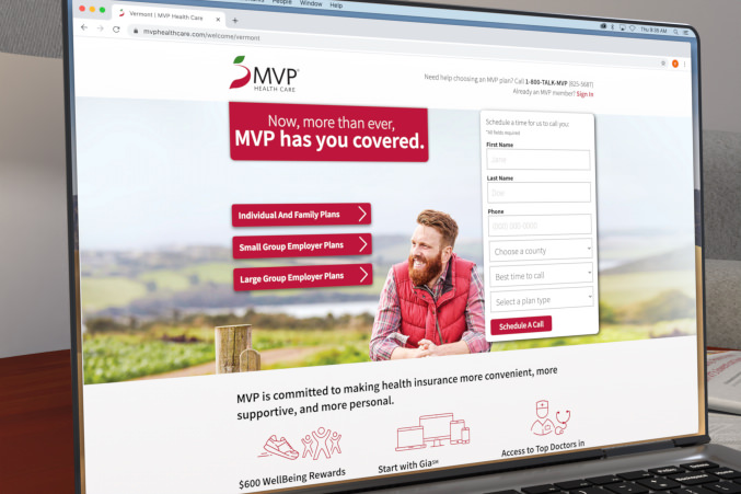 MVP landing page shown on a laptop