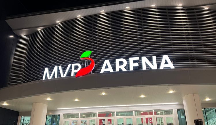 Outside view of the MVP arena sign lit up at night