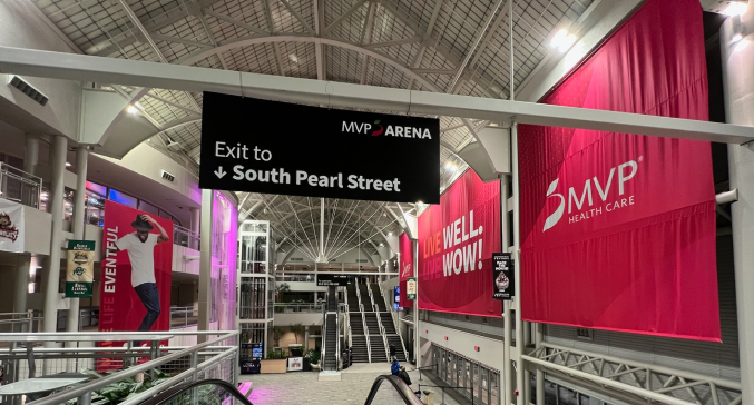 Long inside view of MVP Arena and signage after rebrand