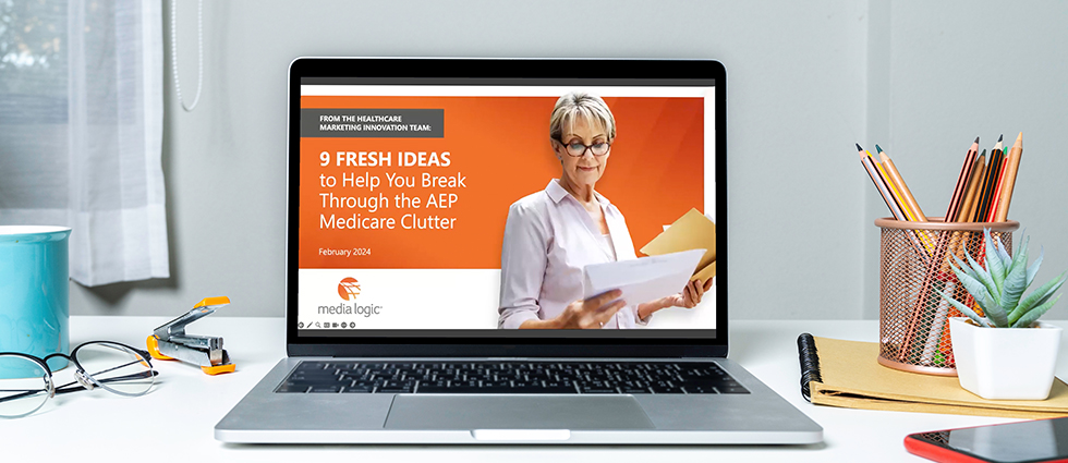 AEP Medicare Marketing webinar on computer screen on desk