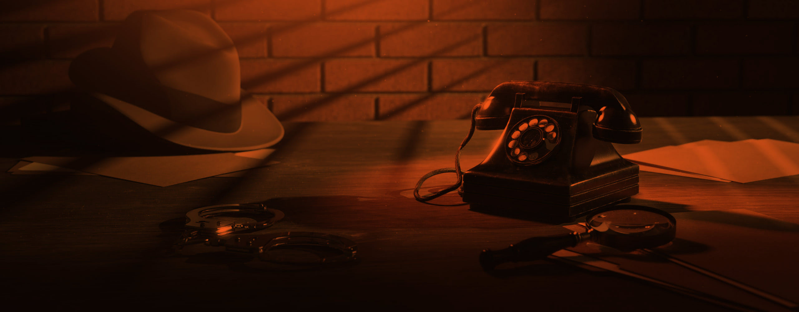 Image of a hat and phone on a desk depicting 